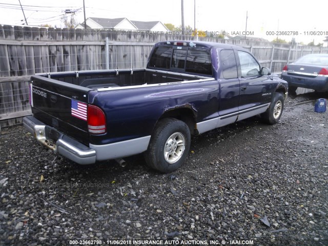 1B7GL22X5XS104624 - 1999 DODGE DAKOTA PURPLE photo 4