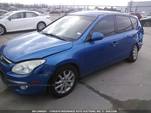 KMHDC86E89U039382 - 2009 HYUNDAI ELANTRA TOURING  BLUE photo 6