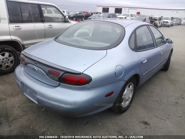 1FAFP52U7WA118106 - 1998 FORD TAURUS LX/SE Light Blue photo 4