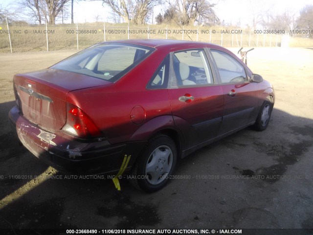 1FAFP33PX3W269890 - 2003 FORD FOCUS LX RED photo 4
