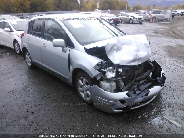 3N1BC13E29L360872 - 2009 NISSAN VERSA S/SL SILVER photo 1