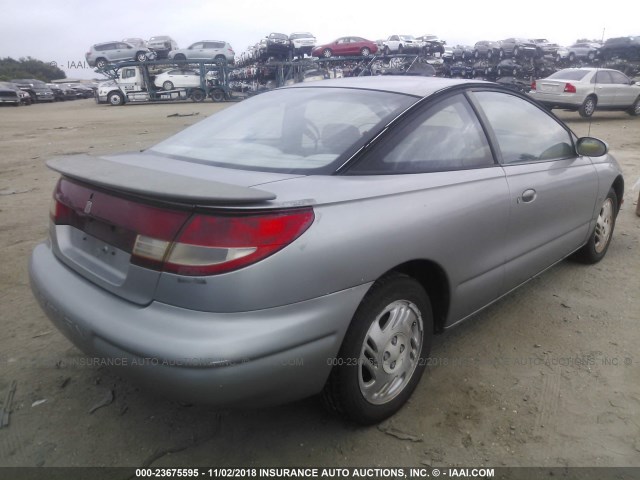 1G8ZG127XXZ135540 - 1999 SATURN SC2 SILVER photo 4