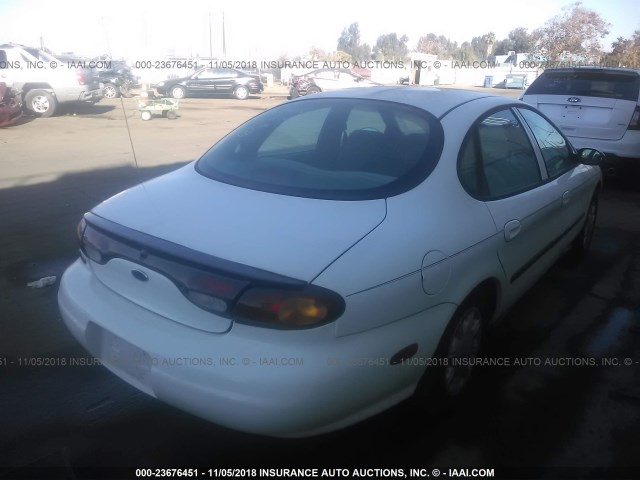 1FALP51UXTG256381 - 1996 FORD TAURUS G WHITE photo 4