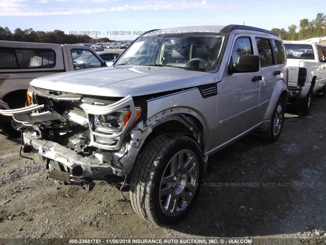 1D4PT4GX6BW606597 - 2011 DODGE NITRO HEAT WHITE photo 2