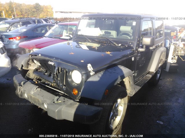 1J4AA2D19AL164129 - 2010 JEEP WRANGLER SPORT BLACK photo 2