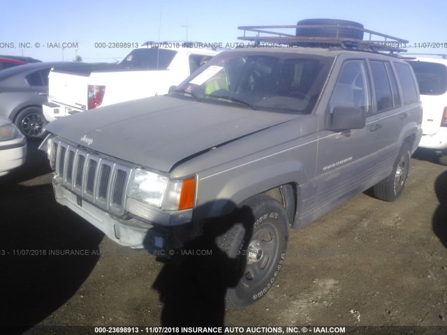 1J4GZ58S2VC560707 - 1997 JEEP GRAND CHEROKEE LAREDO/TSI GREEN photo 2