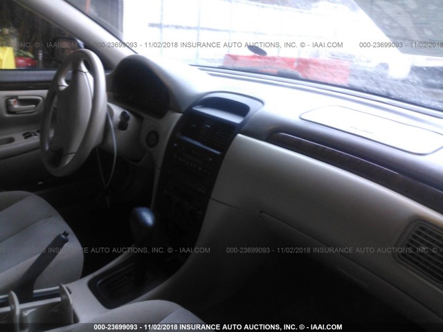 2T1CF22P5XC208862 - 1999 TOYOTA CAMRY SOLARA SE/SLE შავი ფოტო 5