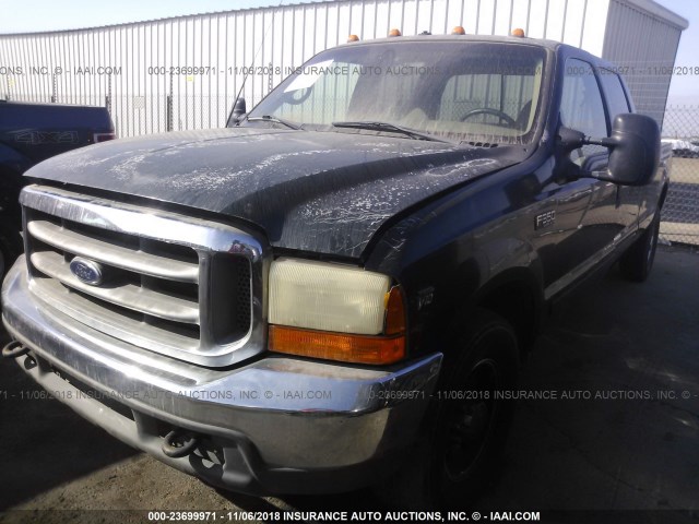 1FTSW30S91EA76430 - 2001 FORD F350 SRW SUPER DUTY GRAY photo 2