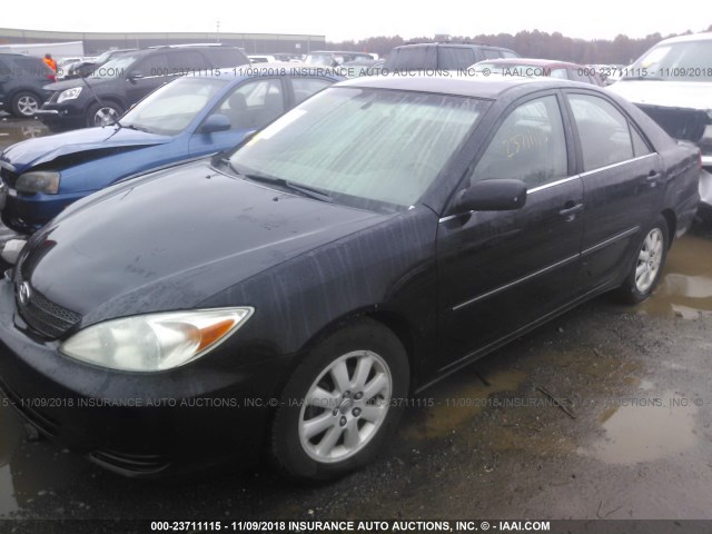 4T1BE30K02U053253 - 2002 TOYOTA CAMRY LE/XLE/SE BLACK photo 2