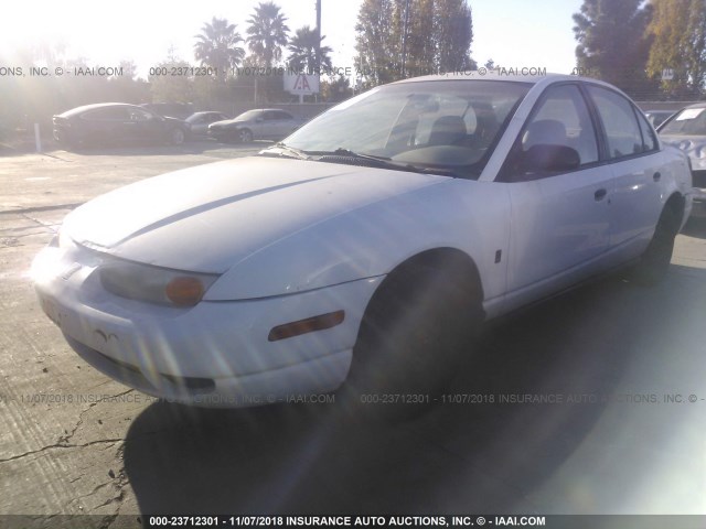 1G8ZG5288YZ132881 - 2000 SATURN SL1 WHITE photo 2