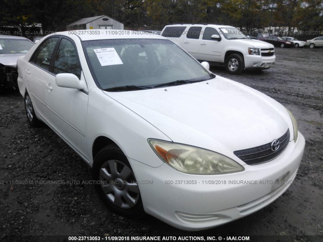 4T1BE32K04U269653 - 2004 TOYOTA CAMRY LE/XLE/SE WHITE photo 1