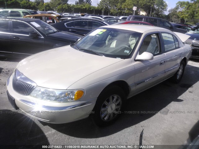 1LNHM97V41Y730201 - 2001 LINCOLN CONTINENTAL  TAN photo 2