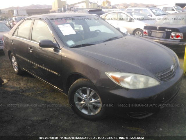 JTDBE30K920131329 - 2002 TOYOTA CAMRY LE/XLE/SE BURGUNDY photo 1