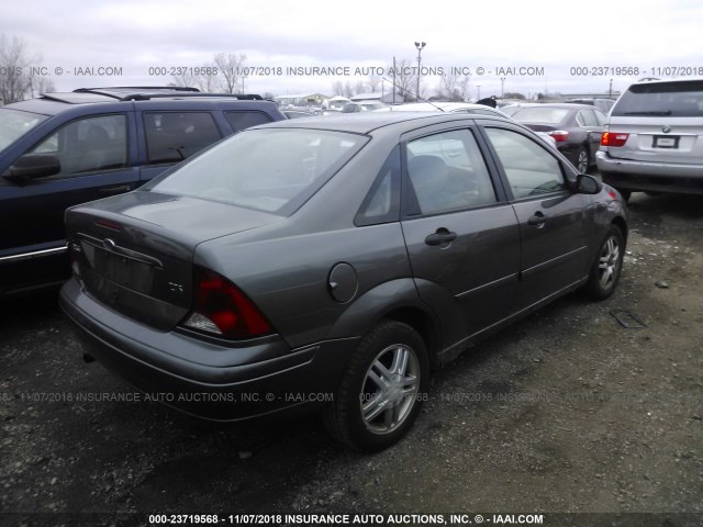 1FAFP38Z74W137696 - 2004 FORD FOCUS ZTS GRAY photo 4