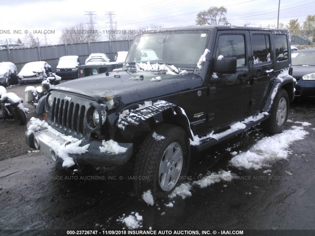 1J4HA5H1XAL125687 - 2010 JEEP WRANGLER UNLIMITE SAHARA GRAY photo 2