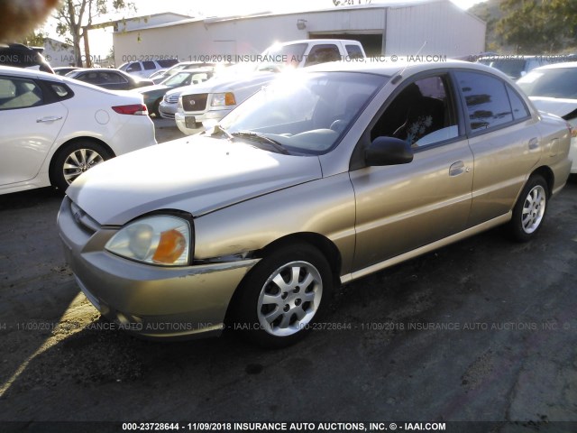 KNADC125746337014 - 2004 KIA RIO GOLD photo 2