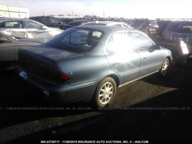 1Y1SK5385PZ068538 - 1993 GEO PRIZM LSI BLUE photo 4