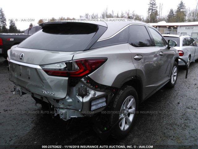 2T2BZMCA5HC119590 - 2017 LEXUS RX 350/BASE/F SPORT SILVER photo 4