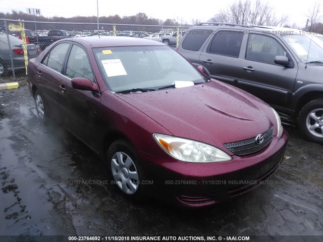 4T1BE32K52U028829 - 2002 TOYOTA CAMRY LE/XLE/SE RED photo 1