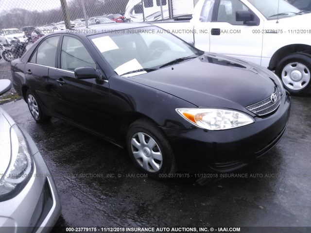 4T1BE32K52U005504 - 2002 TOYOTA CAMRY LE/XLE/SE BLACK photo 1
