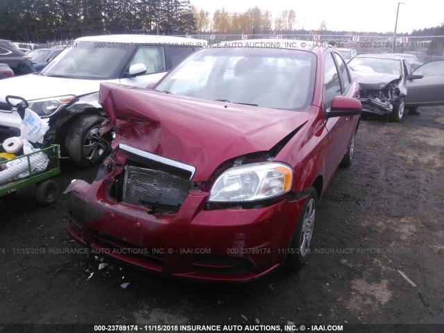 KL1TD5DE7AB127667 - 2010 CHEVROLET AVEO LS/LT წითელი ფოტო 2