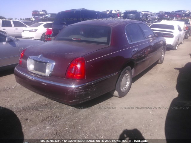 1LNHM81W0YY903296 - 2000 LINCOLN TOWN CAR EXECUTIVE MAROON photo 4
