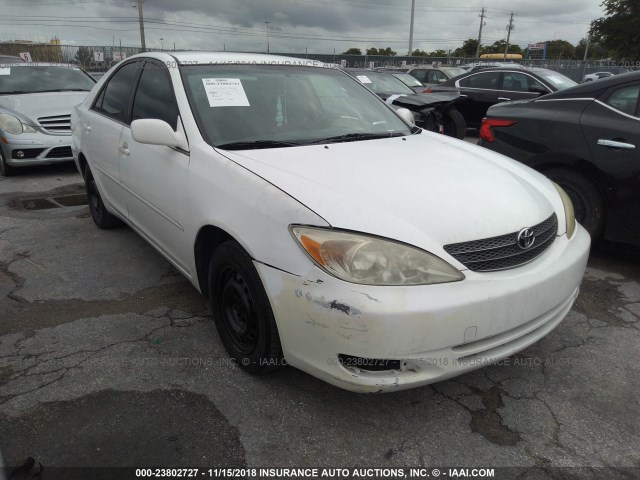JTDBE32K130171886 - 2003 TOYOTA CAMRY LE/XLE Ақ фото 1