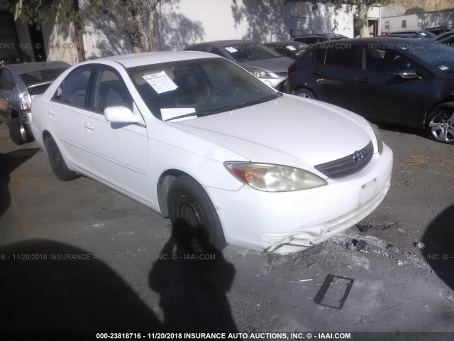 4T1BE32KX3U183717 - 2003 TOYOTA CAMRY LE/XLE/SE WHITE photo 1