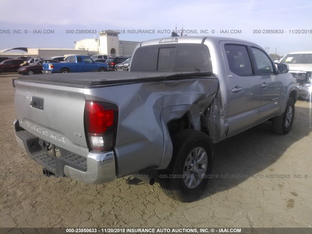 5TFAZ5CN8JX062494 - 2018 TOYOTA TACOMA DBL CAB/SR5/TRD SPORT/OR SILVER photo 4