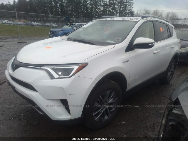 JTMRJREV8JD219571 - 2018 TOYOTA RAV4 HV LE PLUS/XLE WHITE photo 2